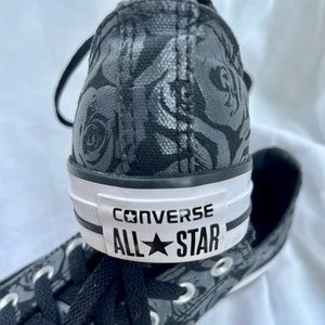 Converse shoes with a rose print size 8